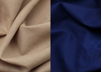 Close-up of beige fabric on the left and blue fabric on the right.