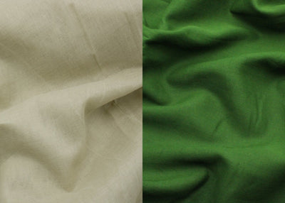 Close-up of beige fabric on the left and green fabric on the right.