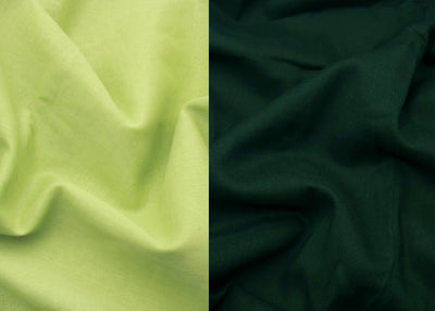 Two swatches of fabric, one light green and one dark green, side by side.